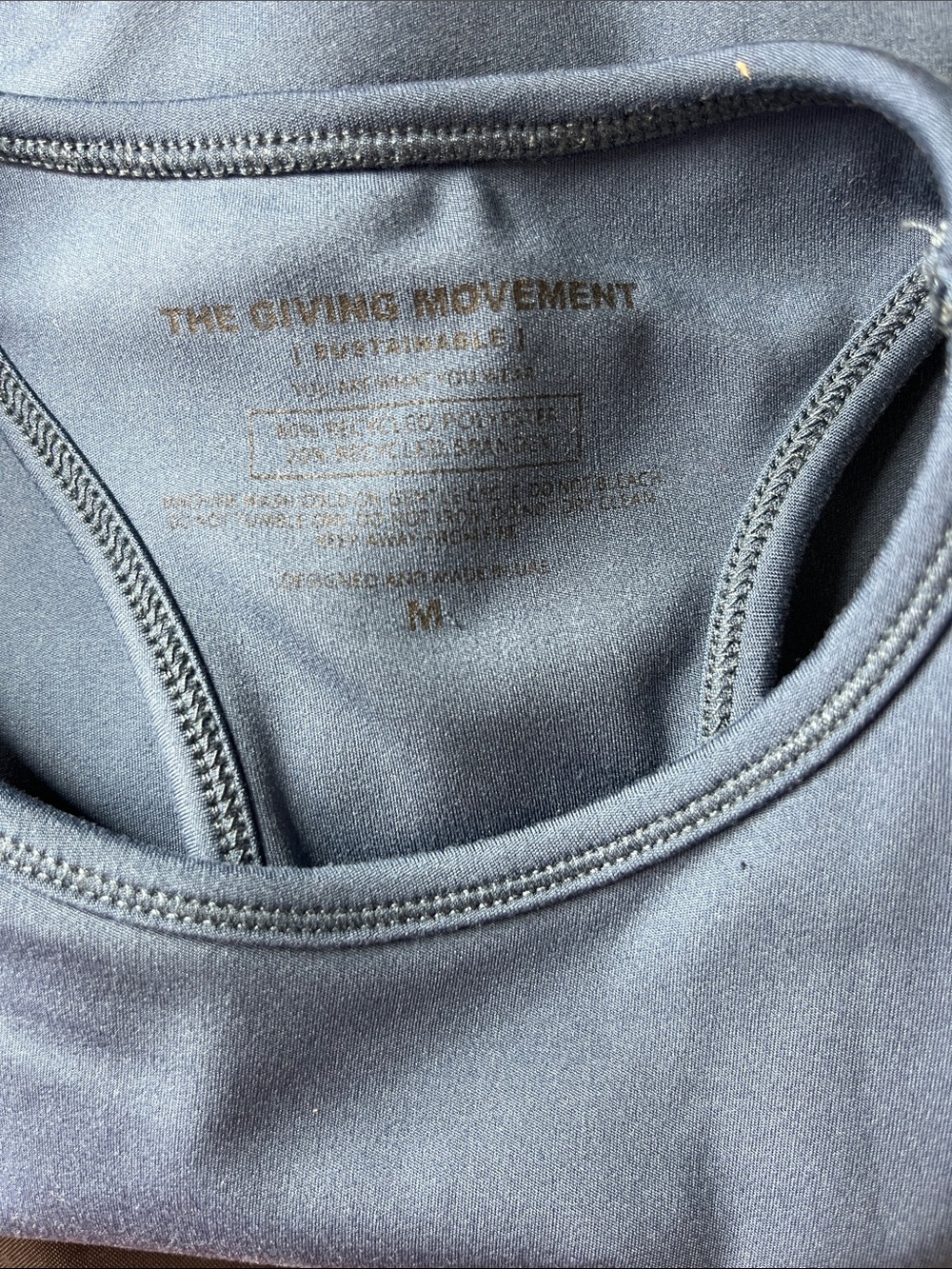 The Giving Movement Navy Racerback Tank Top - Picture 7 of 7